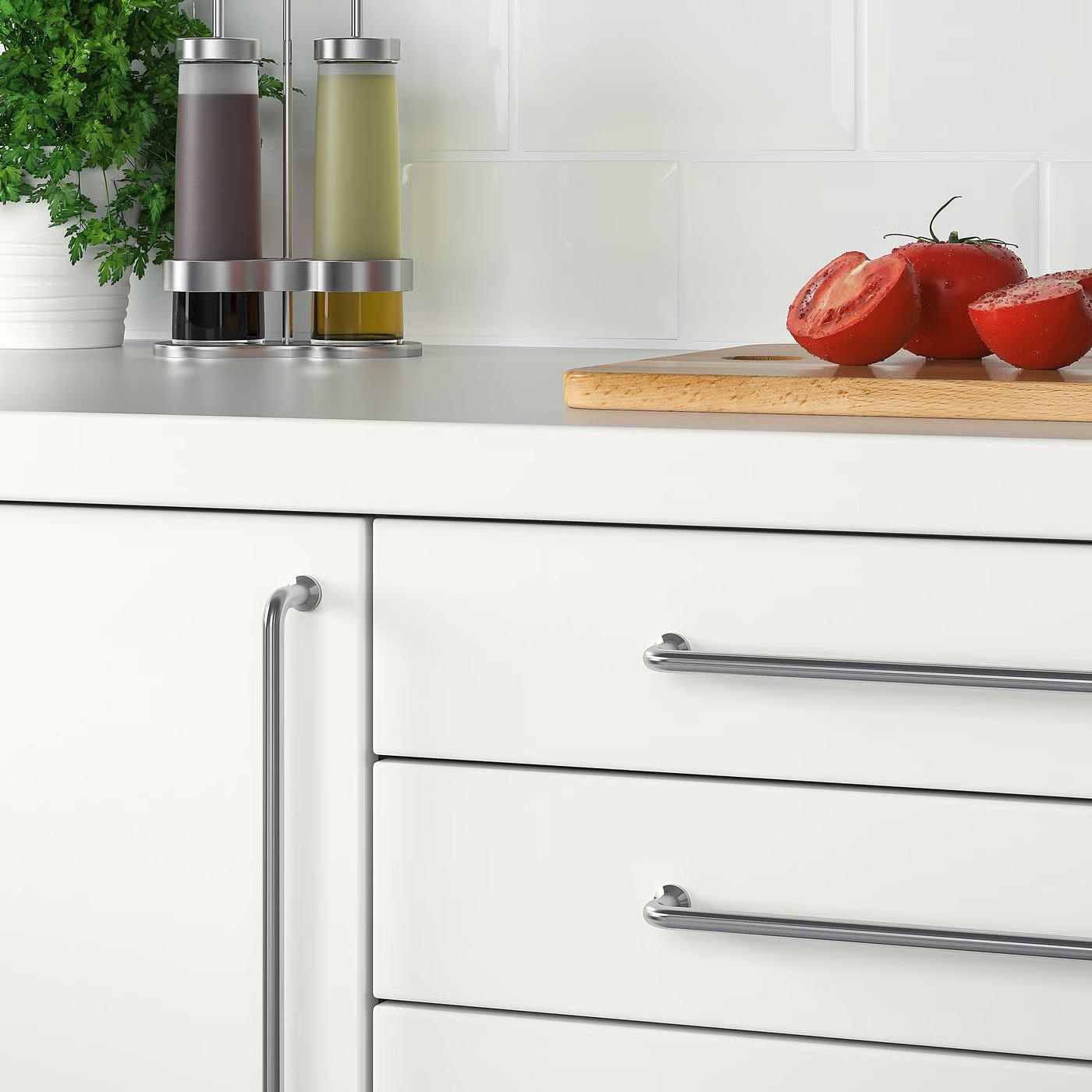 Kitchen — white shaker cabinets with stainless hardware